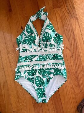 CocoShip Monstera/Palm print one piece with mesh cutout and tassels!